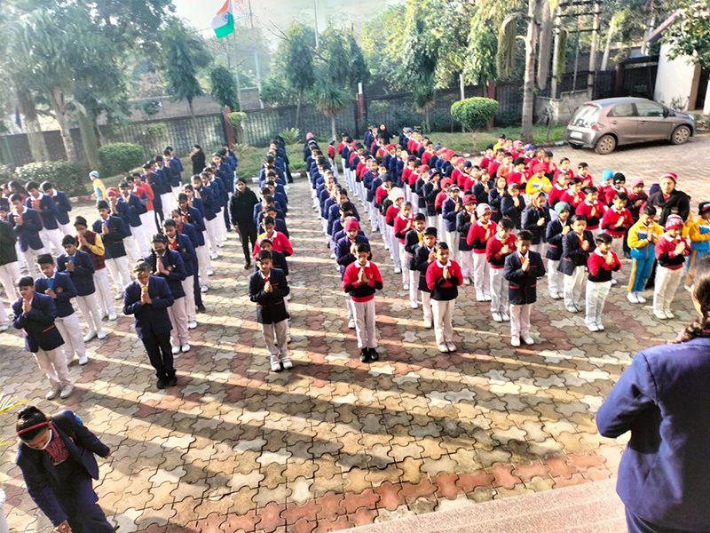 A group of students in a school assembly
